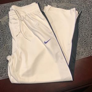 White Nike gym pants.